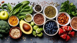 healthy-food-clean-eating-selection-fruit-vegetable-seeds-su | Superfoods To Boost A Healthy Diet | Featured