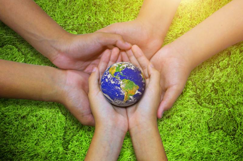 earth planet asian children hand on ways to help the environment