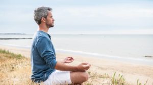 he-meditating-his-hands-turn-sky | Amazing Benefits Of Meditation | Featured
