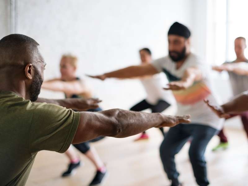 MADasWQaqTo-diversity-people-exercise-class-relax-concept | benefits of kegel exercises | Kegel Exercises for Men to Last Longer