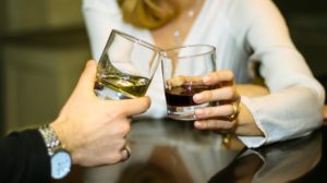Crop Couple Toasting With Glasses in Restaurant | First Date Tips for Men-px-featured