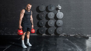 active strong sweaty fit muscular | How To Do Farmer’s Walk Efficiently | Featured