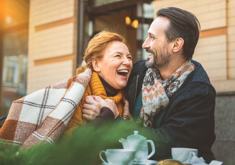 Man-and-woman-dating-in-cafe | things to do when you turn 50 years old 