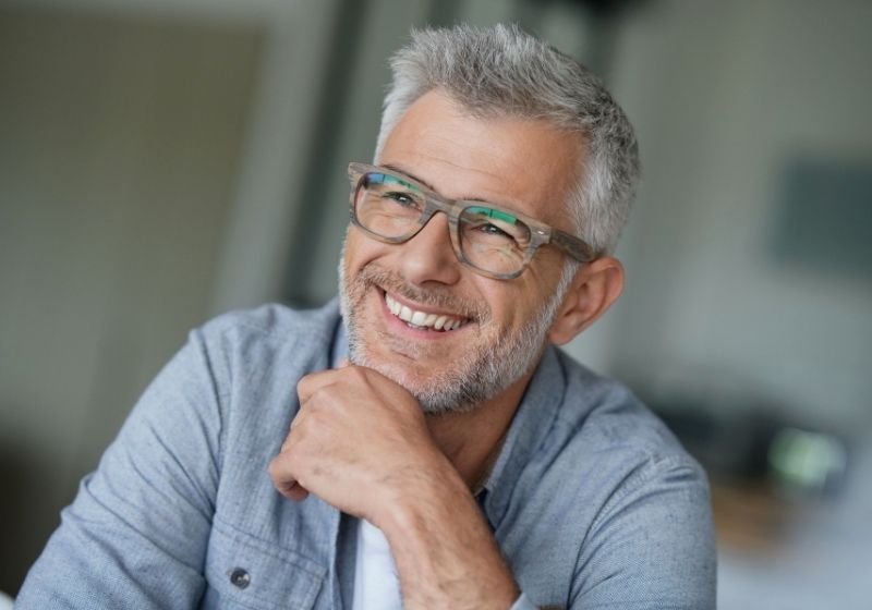 Middle-aged-guy-with-trendy-eyeglasses | things to do when you turn 50 years old 
