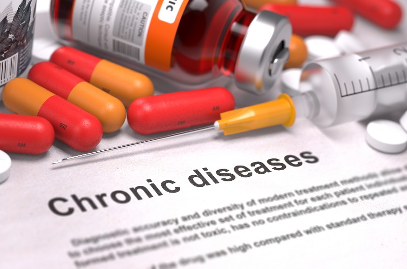 Diagnosis - Chronic Diseases. Medical Concept with Red Pills, Injections and Syringe-Health Issues of Retirees