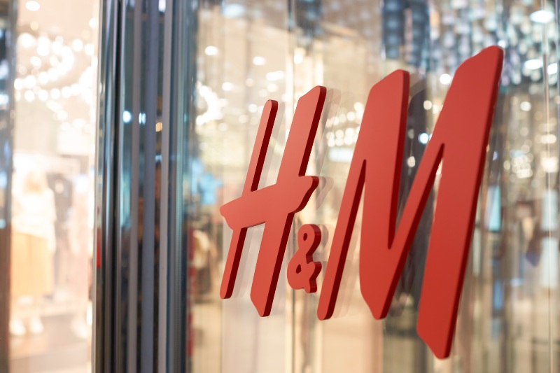 Close-Up Shot of H&M Logo | Ageism in the Workplace