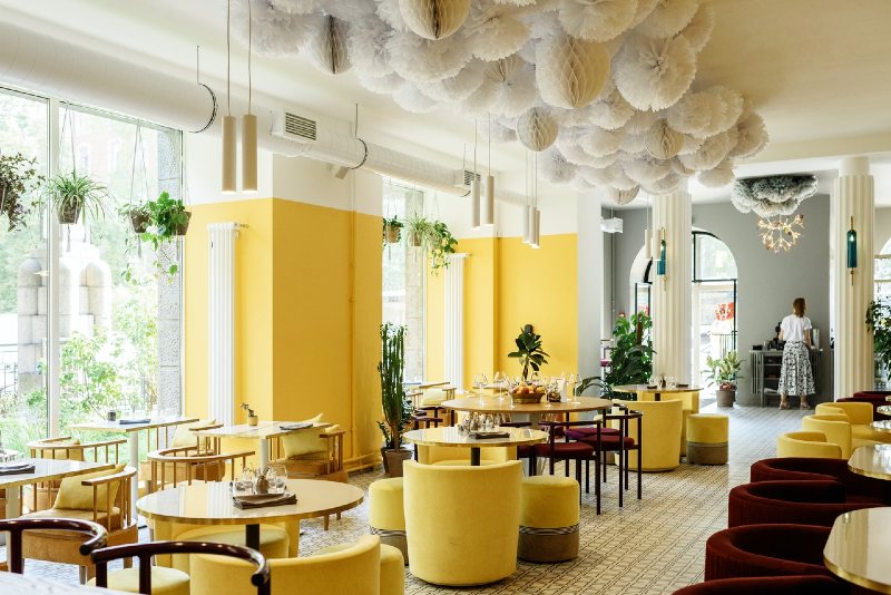 interior of stylish contemporary restaurant with big windows | olive garden senior discounts