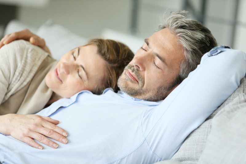 mature couple having rest laying down | taking naps