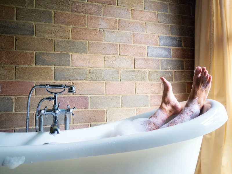 mens feet covered foam bubble bath | prostatitis treatments