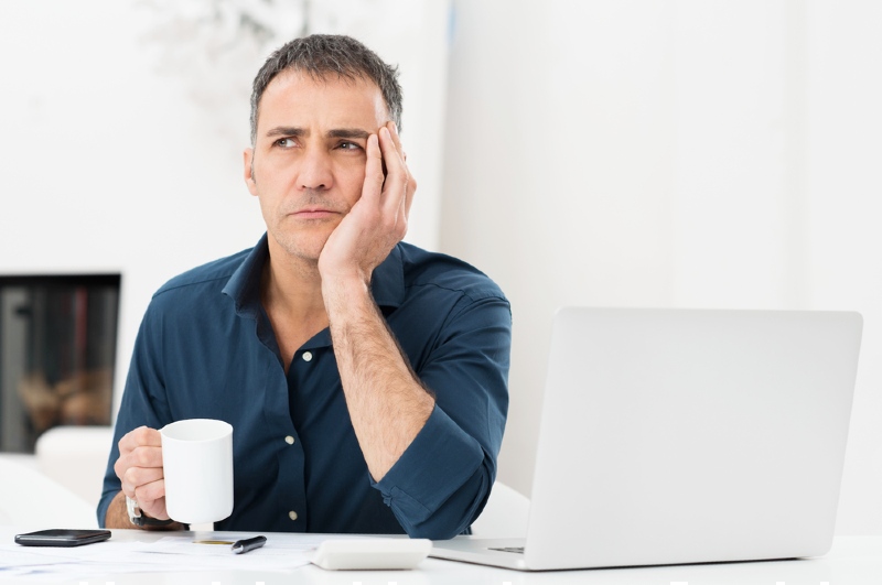 portrait worried mature man laptop holding | emotional detox meditation