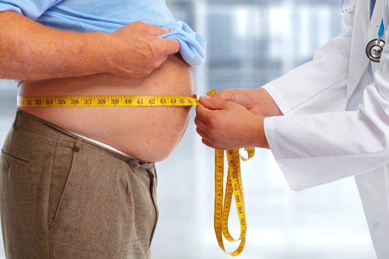 Doctor Measuring Obese Man Waist | Type 2 Diabetes Symptoms