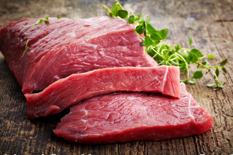 fresh raw meat on old wooden | foods that will lower high blood pressure