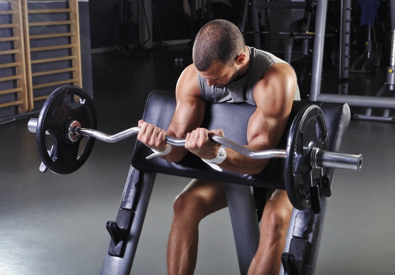 Man Doing Biceps Exercise | Strength Training
