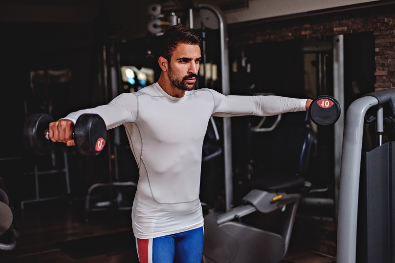 Man Doing Shoulder Raises | Strength Training