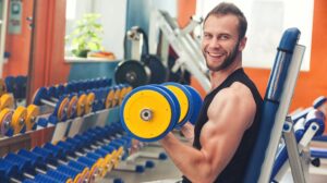 Man Lifting Weights in the Gym | Strength Training | Featured