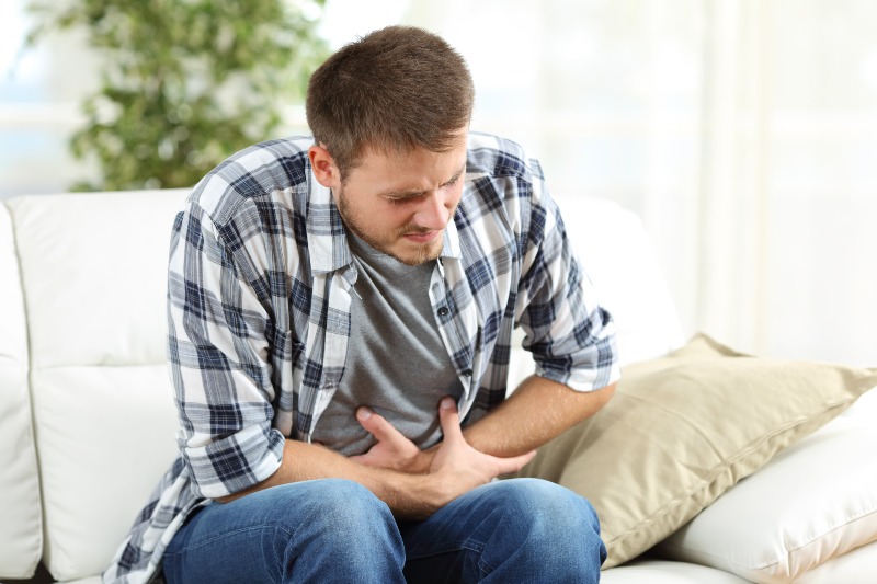 Man Suffering from Stomachache | Stress Symptoms