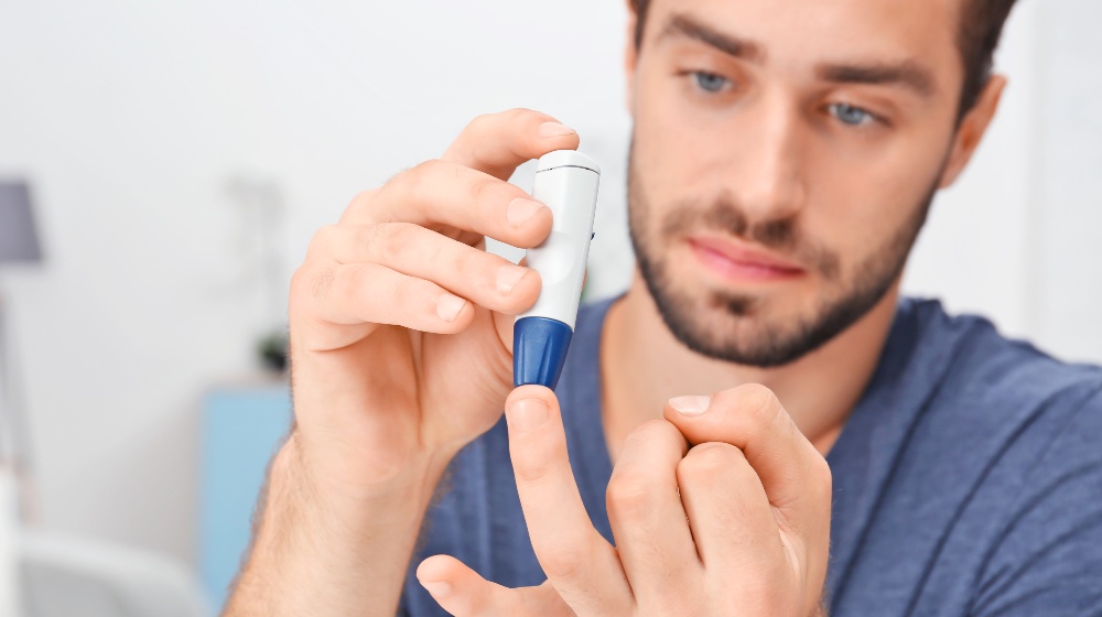 Man Taking Blood Sample | Type 2 Diabetes Symptoms | Featured