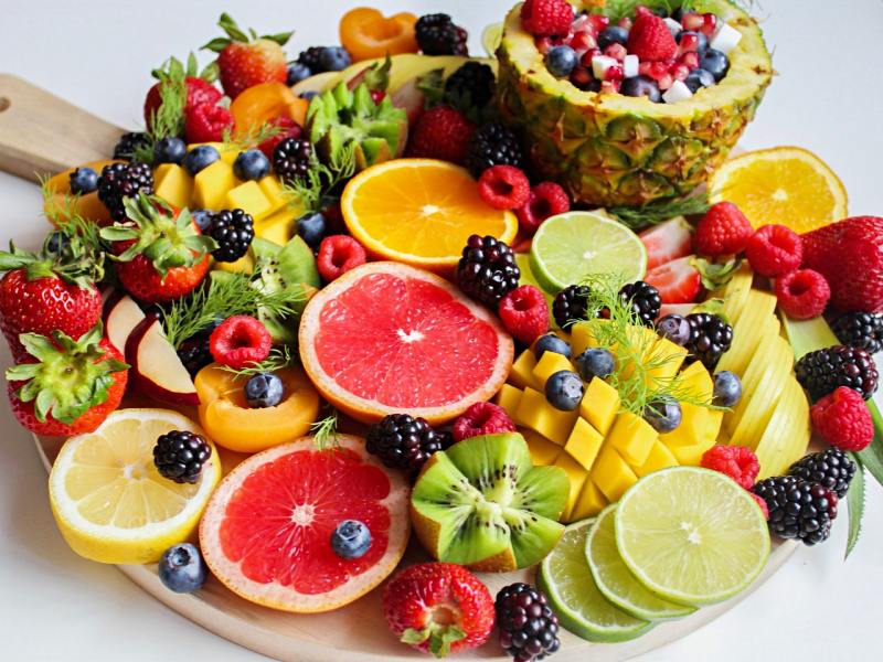 sliced fruits on tray high sugar diet | long term effects of high sugar diet