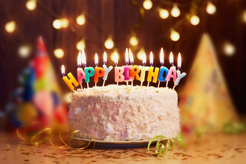 birthday cake candles bright lights bokeh | planning for retirement