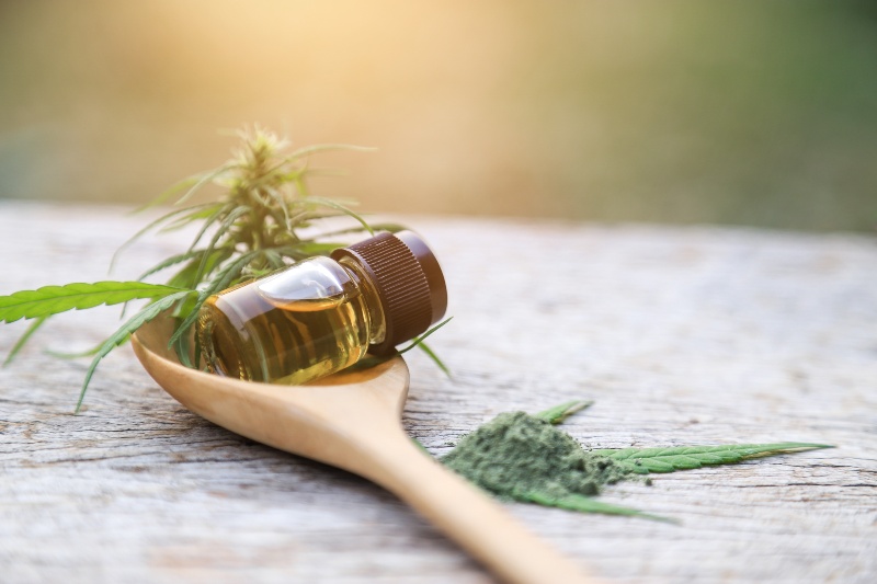 Herbal Cannabis Oil on Wooden Spoon | Sports Performance