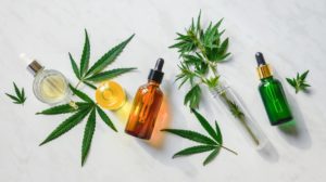 Various Glass Bottles with CBD Oil | Sports Performance | Featured