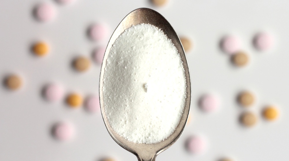closeup myoinositol powder on spoon commonly | The 5 Benefits of Inositol | Featured