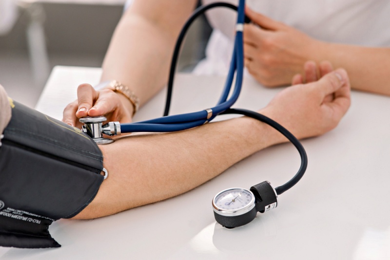 doctor uses sphygmomanometer stethoscope check patients | kidney problems