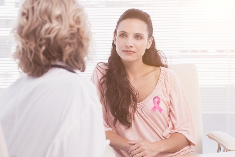 Female Patient Listening to Doctor | CoQ10 Benefits