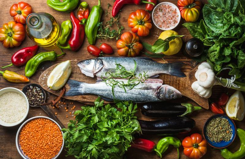 raw uncooked seabass fish vegetables grains | estrogen dominance symptoms