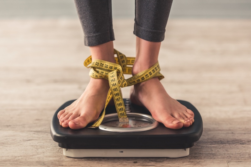 Standing on Weigh Scale | Unhealthy Gut