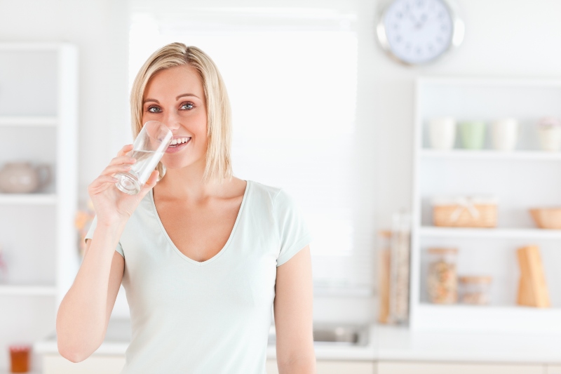 Woman Drinking Water | Unhealthy Gut