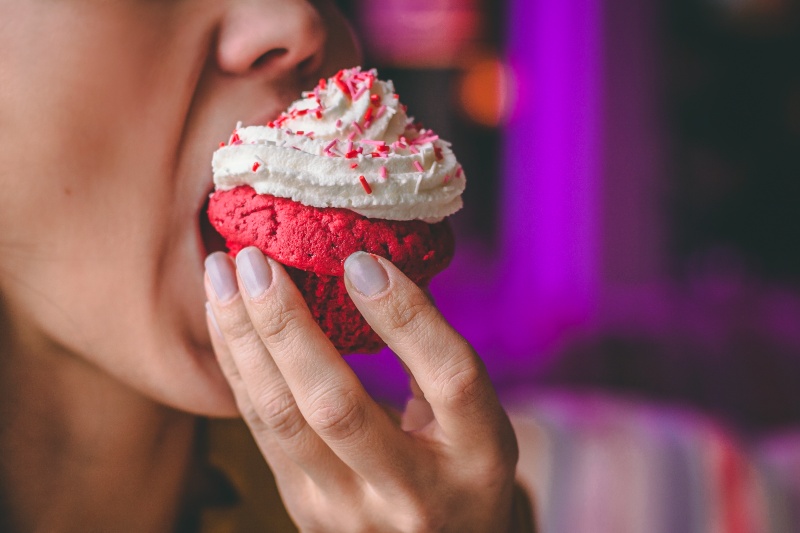Woman Eating Cupcake | High Triglycerides and Pancreatitis