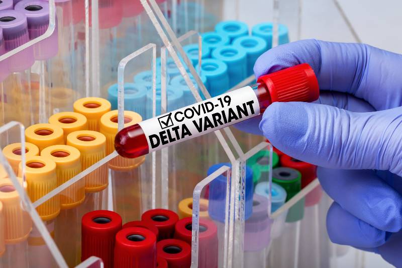 Doctor testing with blood test tube from patient infected with Coronavirus Delta variant-Delta variant