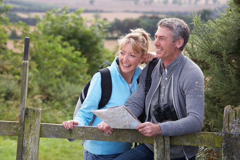 mature couple on country walk | selenium benefits for thyroid