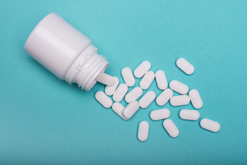 medication bottle white pills spilled on | medications that cause high blood sugar