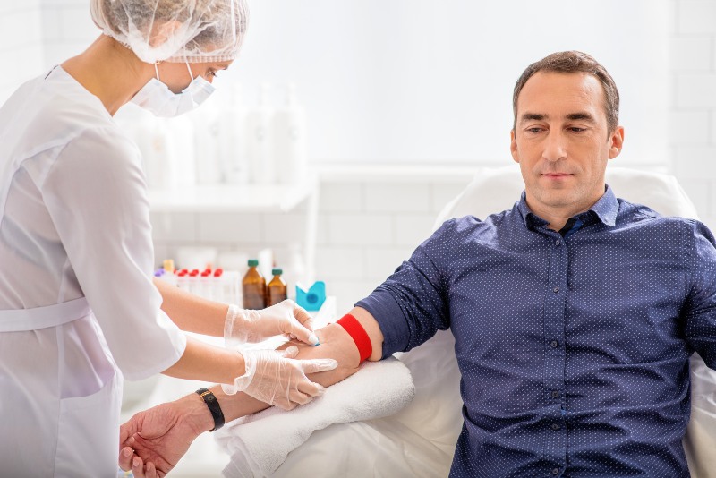 Nurse and Patient Doing Blood Test | Hyperparathyroid Symptoms