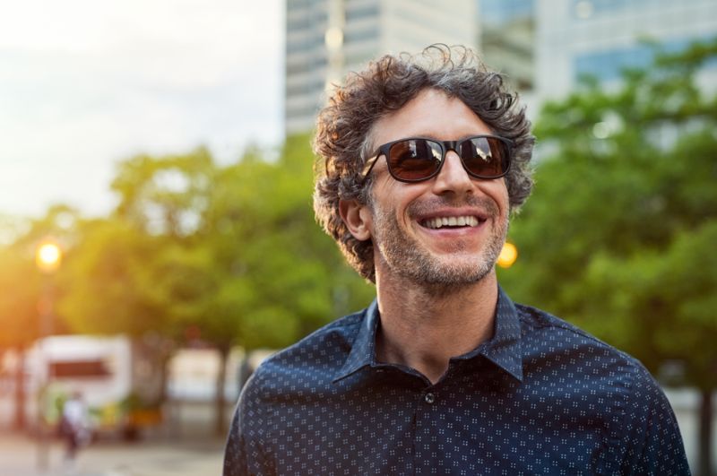 portrait smiling man wearing sunglasses looking omad benefits SS 1