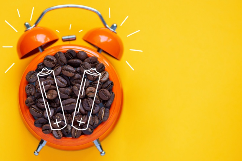 coffee beans orange alarm clock on | pros and cons of drinking coffee