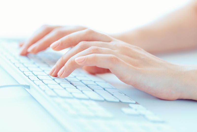 female hands woman office worker typing | top of wrist pain