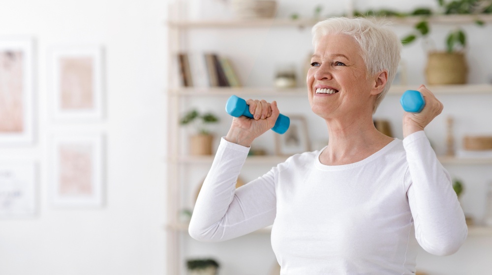 Healthy Lifestyle Smiling Senior Lady Exercising with Dumbbells at Home | Standing Core Exercises for Seniors | Featured