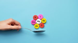 Icons of Minerals and Macronutrients on a Spoon | What Are the Trace Minerals | Featured