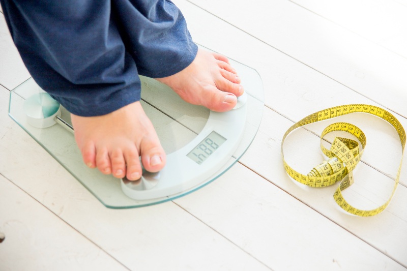 Standing on Weighing Scale | Low Iodine Symptoms