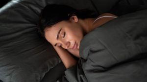 A beautiful young woman lying in bed comfortably and blissfully | Falling Asleep Quickly | featured