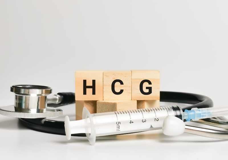 Phrase HCG Written on Wooden Cubes | HCG Diet Protocol