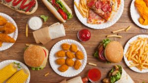 mix fast food street dishes background | Eating Fast Food Everyday | Which Fast Foods Have the Most Toxins? | Featured