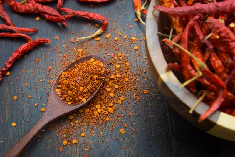 Cayenne pepper on the wooden floor | Natural Blood Thinners