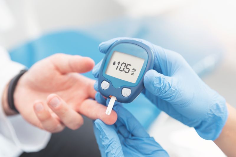 Doctor checking blood sugar level glucometer | Insulin sensitivity factor