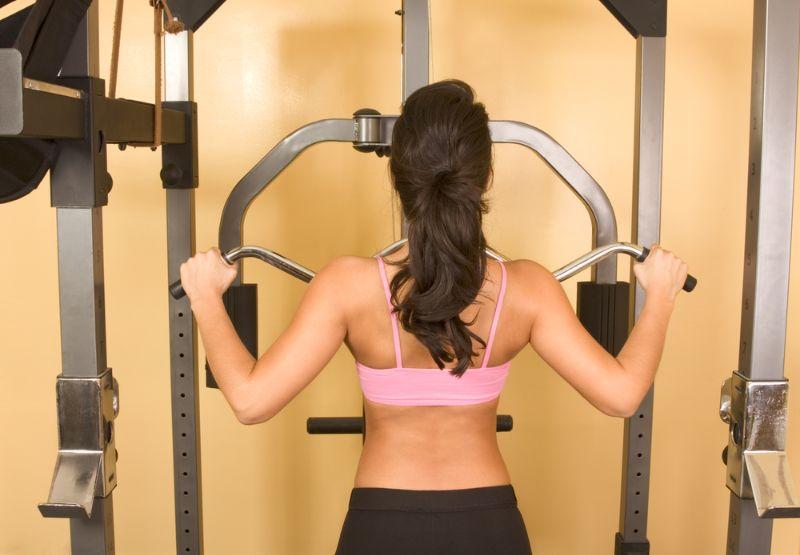 attractive young female working out on Metabolic Fitness