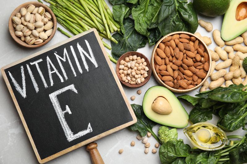 Small Chalkboard with Phrase Vitamin E and Different Products | How Is Vitamin E Thought to Play a Role in Reducing the Risk of Heart Disease
