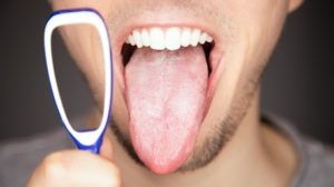 Tongue Color Meaning | white covered and coated tongue out with tiny bumps is indicator for sickness and infections and reason for bad breath and smell | Tongue Color Health Meaning